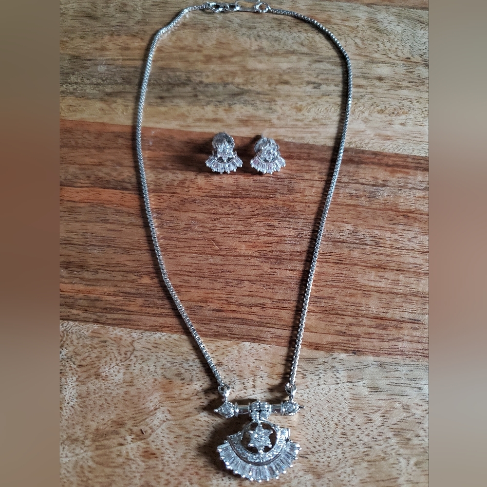 Pendant and stud earring American diamond set